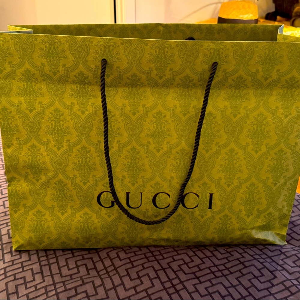 Gucci shopping bag with receipt/card holder. From Gucci store.
